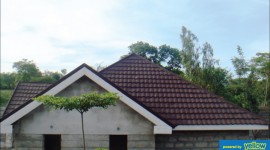 Rexe Roofing Products Ltd - Corrosion Resistant Zinc-aluminium stone coated metal roofing tiles.