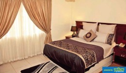 Olive Gardens Hotel - Have a comfortable hotel bed as you relax...